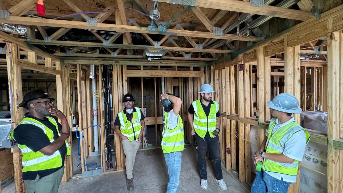 RestoreFast field team reviewing work inside an active construction project